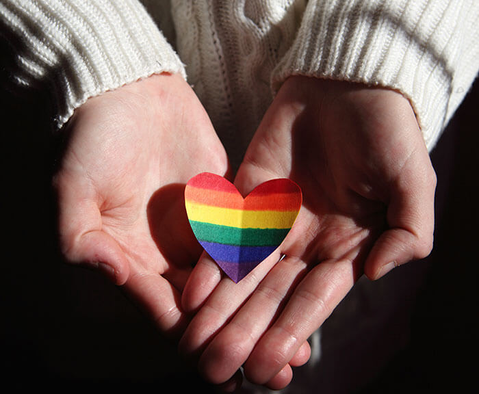 Helping homeless lgbtq youth | Pride heart in open hands